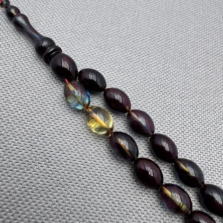 Şeffaf Hareli Usta İşçilikli 8x11mm Sıkma Kehribar Tespih