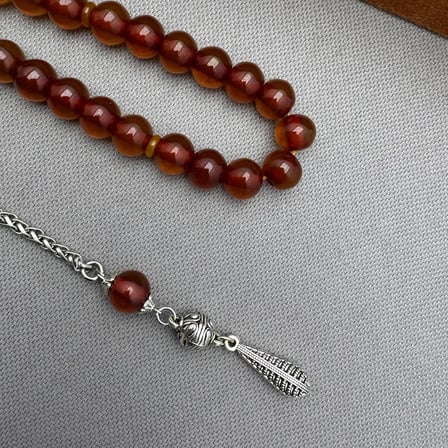 Alpaka Püsküllü Bal Rengi Havşa Delim Sıkma Kehribar Tespih
