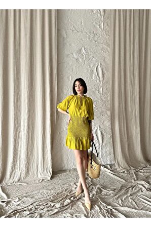 Düğme aksesuarlı mini elbise