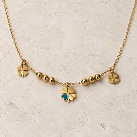 Şansın Mavi İmzası – Üç Yonca Figürlü Gold Renk Boncuk Detaylı Kadın Charm Bileklik