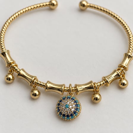Dora’s Shine Mavi Aura Nazar Motifli Taşlı ve Sallantılı Gold Renk Açık Kelepçe Kadın Bileklik