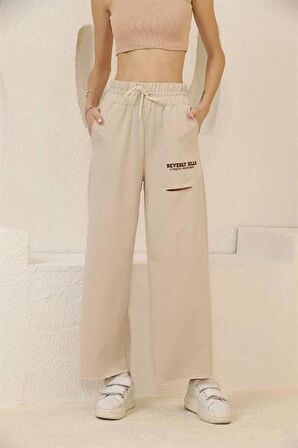 Beli Lastikli Yırtık Detaylı Salaş Kadın Pantolon