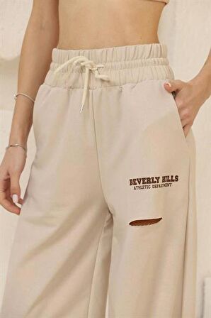 Beli Lastikli Yırtık Detaylı Salaş Kadın Pantolon