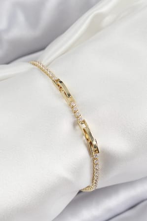 Pirinç Zirkon Taşlı İnce Su Yolu Model Gold Renk Kadın Bileklik