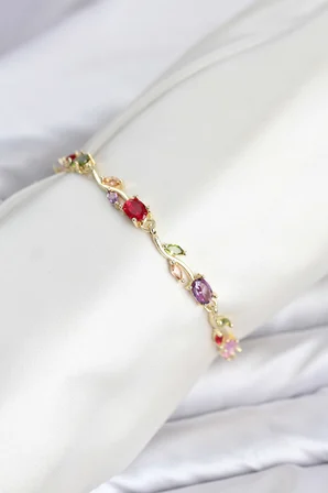 Pirinç Gold Renk Mix Renk Zirkon Taşlı Çiçek Model Kadın Bileklik