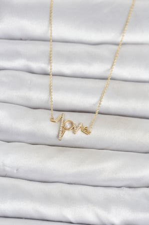 Pirinç Gold Renk Kalp Ritmi Model Kadın Kolye