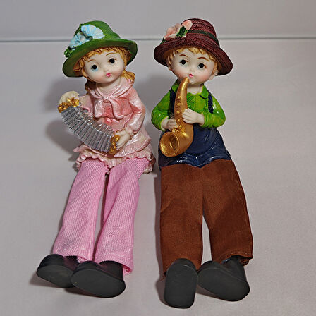 Sallanan Ayaklı Akordeon ve Saksafon Çalan Çocuk Biblosu