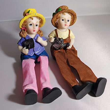 Sallanan Ayaklı Kürek Taşıyan ve Sulama Kabı Tutan Çocuk Biblosu