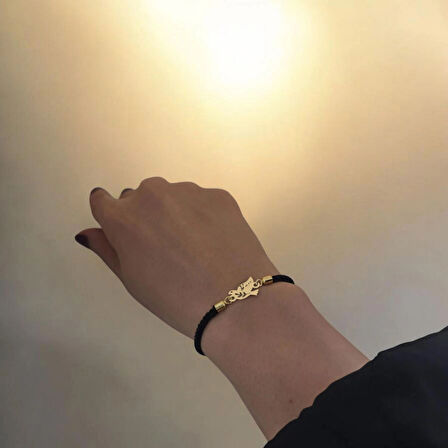 Muazzam Siyah Örgü Detayıyla Kuş Motifli ve 14 Ayar Altın Plakalı Buse Bilekliği