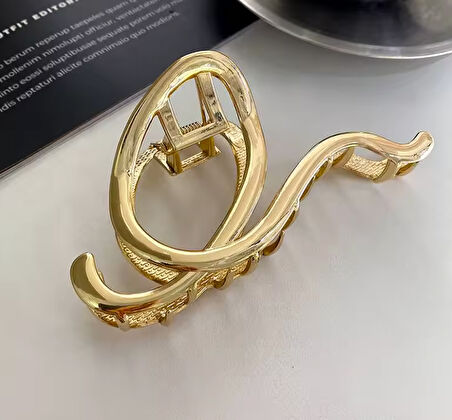 Altın Renk Asimetrik Spiral Metal Mandal Saç Tokası 10 cm – Şık ve Dayanıklı