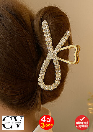 Taş Detaylı Gold Fiyonk Formlu 11 cm Saç Tokası – Zarif ve Işıltılı Tasarım