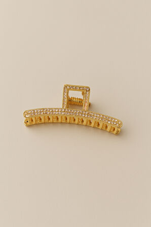 7 cm Gold Taşlı Kavisli Saç Tokası – Şık ve Işıltılı Metal Mandal Toka