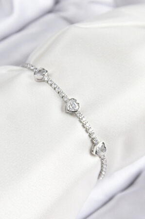 Dodes Pirinç Zirkon Taşlı Sıralı Kalp Model Gümüş Renk Asansörlü Kadın Bileklik TG27BB7728