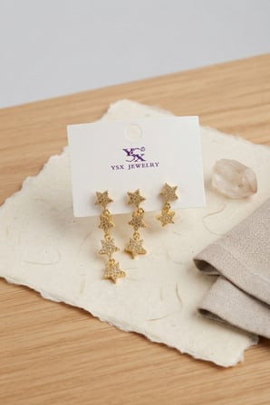 Pirinç Gold Renk Zirkon Taşlı Sallantılı Yıldız Model Kadın Küpe Seti - EBJ261010W47161