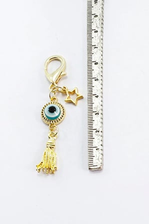 Gold Renkli Metal Çerçeveli Nazar Boncuğu Püsküllü Klipsli Cüzdan Süsü Charm Çanta Süsü Anahtarlık