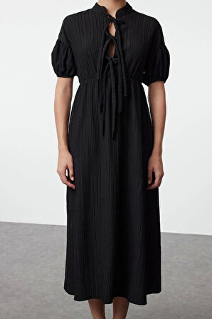 Moda Stil Regular Hakim Yaka Maxi Boy Fiyonk Detaylı Dokuma Elbise