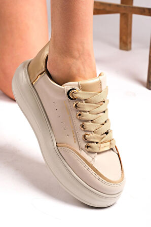 Modaya Uygun Kadın Beyaz Altın Detaylı ve Kalın Tabanlı Spor Ayakkabı 2025 Koleksiyonu GOLD BEJ / 40