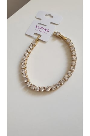 ÇELİK BİLEKLİK XUPİNG SU YOLU BAGET TAŞLI 14 AYAR GOLD RENGİNDE SAVOROSKİ TAŞLI 17+2 CM FMACCESORİES