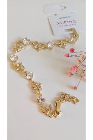 BİLEKLİK ÇELİK  XUPİNG XO  14 AYAR GOLD ROSE RENK VİP SERİ 1 YIL RENK GARANTİLİ