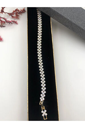 XUPİNG JEWELRY BALIK SIRTI ÇELİK BİLEKLİK TAŞLI 14 K GOLD RENGİNDE 17+2 CM FATURALI RENK GARANTİLİ