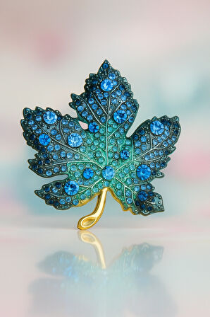 Mavi Taşlı Altın Tonlu Yaprak Formlu Metal Broş Aksesuar
