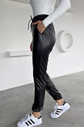 Kadın Bel Ve Paça Lastikli Suni Deri Pantolon