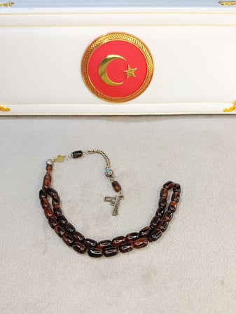 SIKMA KEHRİBAR TESBİH KAPSÜL KESİM