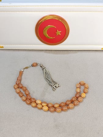 HARELİ SIKMA KEHRİBAR TESBİH BEYAZ HAMUR