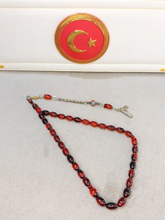 ATEŞ KEHRİBAR TESBİH KIRMIZI SİYAH HARELİ