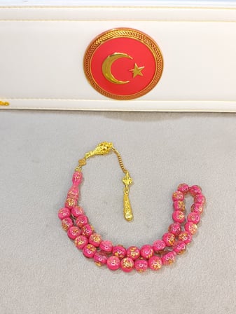 ALTIN VARAKLI TESBİH PEMBE RENKLİ