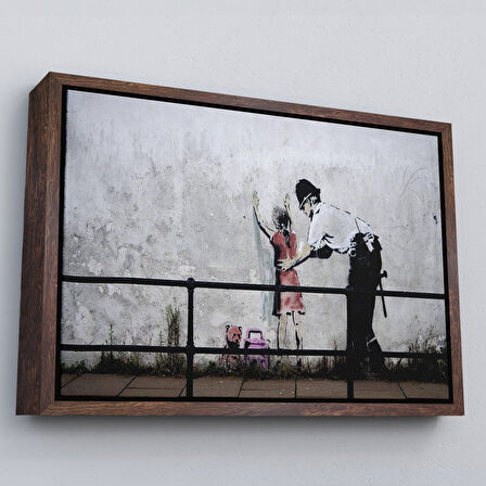 Siyah Çerçeveli Bansky'nin Küçük Kız Çocuğunu Arayan Polis İsimli Çalışması Kanvas Tablo