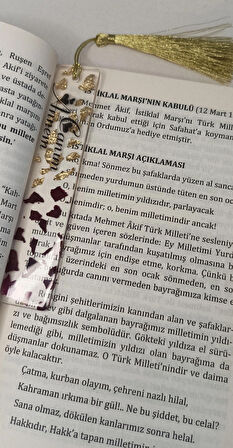 Epoksi Şeffaf zemin içerisinde gül yaprakları ve altın varak parçacıkları içeren üzerinde Canım Annem yazılı kitap ayracı