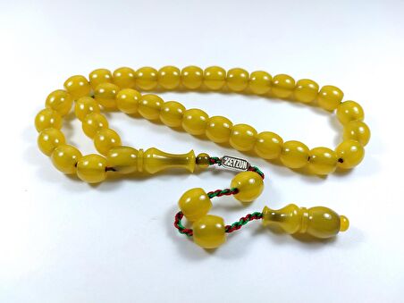 Zeyzun  İmzalı (İmzası Gümüştür) Sıkma Kehribar Beyzi Kesim