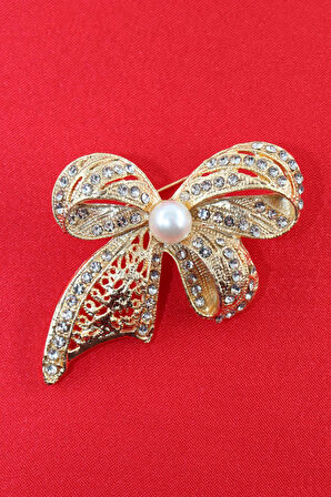 Gold renk incili fiyonk broş. Taşlı tasarım fiyonk broş. Yaka iğnesi fiyonk broş. Fiyonk broş.