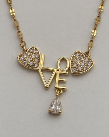 Dora’s Shine Altın Renk LOVE Yazılı Kalp ve Damla Taşlı Paslanmaz Çelik Kolye