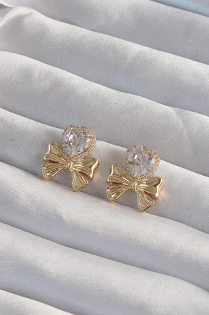 Pirinç Gold Renk Zirkon Taşlı Kalp Model Fiyonk Küpe - Lisinya
