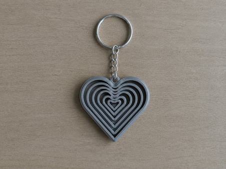 3D Baskı Kalp Fidget Anahtarlık - Hareketli Stres Oyuncağı ve Çanta Süsü-Gri