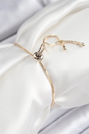 Mey İthalat® Pirinç Zirkon Taşlı Nazar Yıldız Model Gold Renk Asansörlü Kadın Bileklik