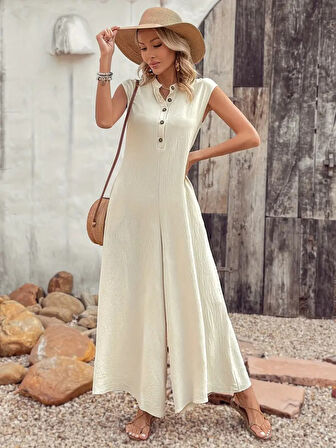 Kadın Kısa Kollu önden Düğmeli Paçaya Doğru Geniş Cepli Uzun Bürümcük Tulum