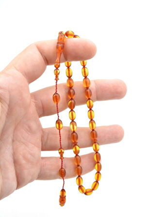 Hakkı Usta İmzalı Beyzi Kesim Şeffaf Bej Sıkma Kehribar Tesbih Bilek Boy