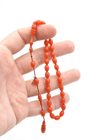 Hakkı Usta İmzalı Beyzi Kesim Bilek Boy Pembe Sıkma Kehribar Tesbih