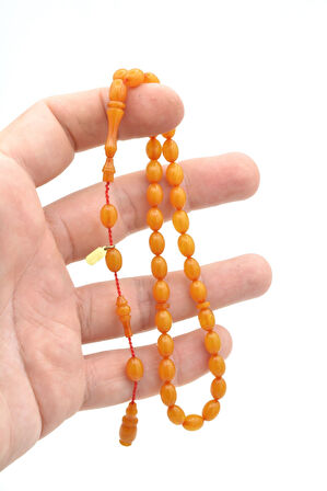 Hakkı Usta İmzalı Beyzi Kesim Bilek Boy Hareli Bej Sıkma Kehribar Tesbih