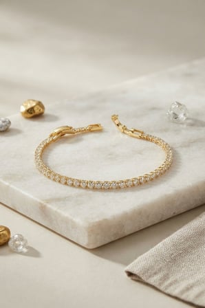 Pirinç Gold Renk İnce Zirkon Taşlı Su Yolu Kadın Bileklik