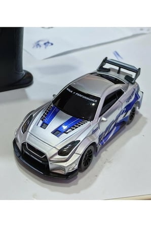 1:43 Ölçek Metal Şarjlı Mini Drift Rc 15 Km Hız 4 Çeker Nissan Gtr Tasarım Profesyonel Uzaktan Kumandalı Drift ve Yarış Arabası