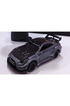 1:43 Ölçek Metal Şarjlı Mini Drift Rc 15 Km Hız 4 Çeker Nissan Gtr Tasarım Profesyonel Uzaktan Kumandalı Drift ve Yarış Arabası