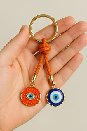 Çift Nazar Boncuklu Anahtarlık – Turuncu İpli Şans ve Koruma Sembolü Göz Motifli Metal Anahtarlık