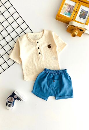 Neşeli Bebekler Müslin Kumaş Kısa Kollu Cepli Şortlu Takım Mavi