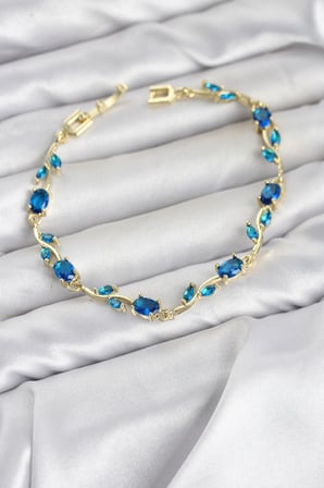 Hepsi Pirinç Gold Renk Mavi Zirkon Taşlı Çiçek Model Kadın Bileklik 5886 Najmaddin
