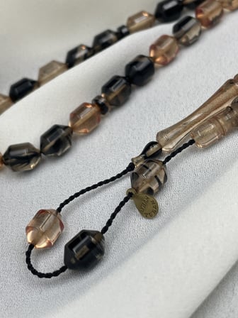 Ayhan Turan İmzalı El Boy Kapsül Siyah-Şampanya Sıkma Kehribar Tesbih (7x10 mm)