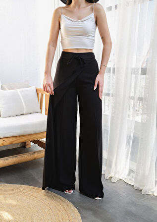 Keten Önü Çapraz Parçali Lasti̇kli̇ Ve Bağcikli Geni̇ş Paça Pantolon